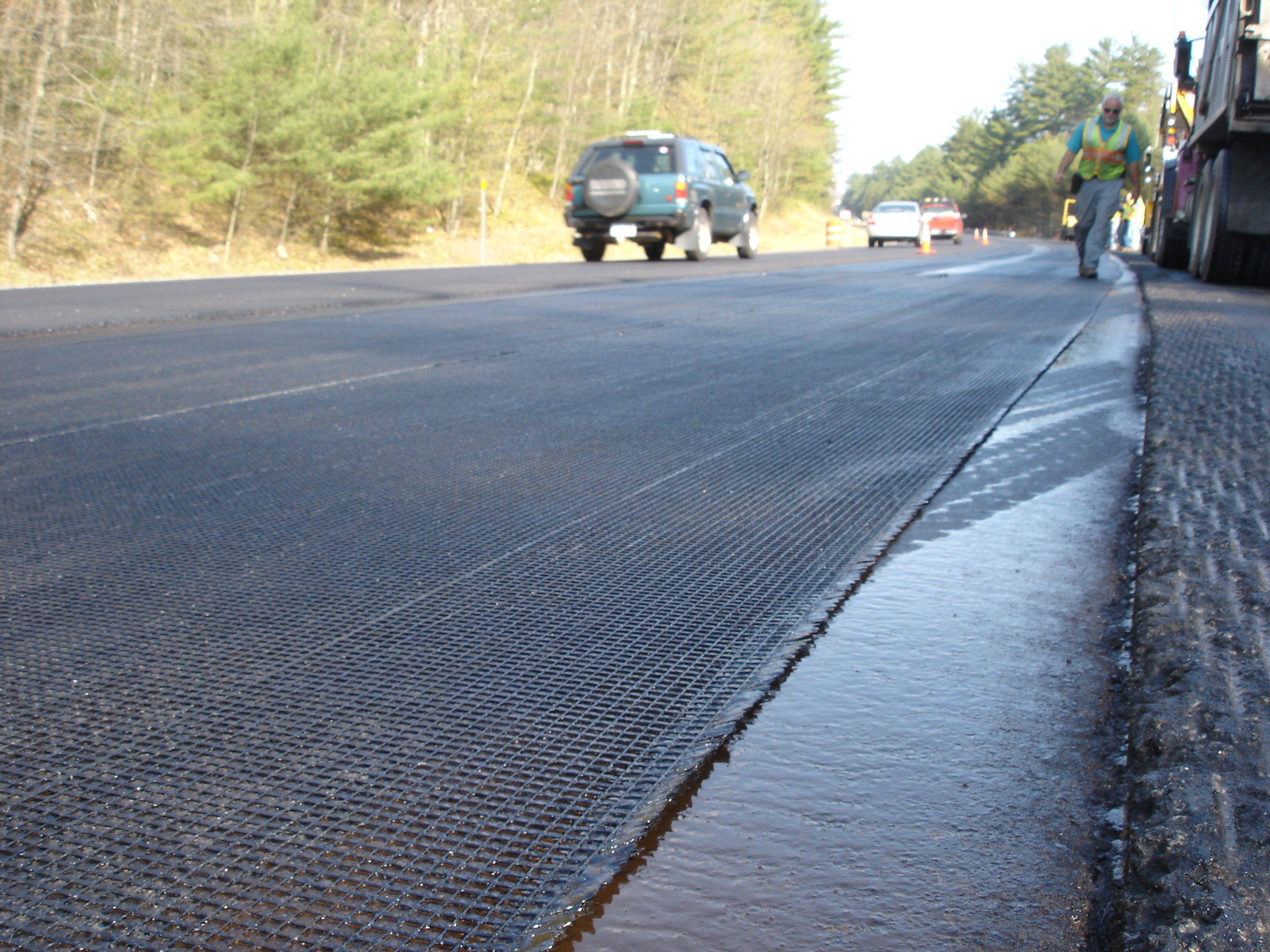 Interlayers: Asphalt Coatings vs. Elastomeric Polymer Coatings